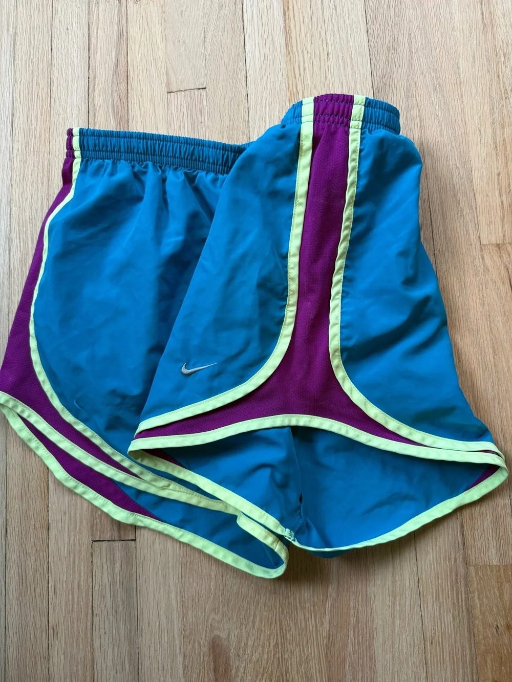 Nike Women's Teal Running Shorts with Purple Panels & Neon Yellow Trim